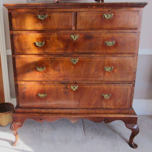 Antique walnut chest of drawers on legs